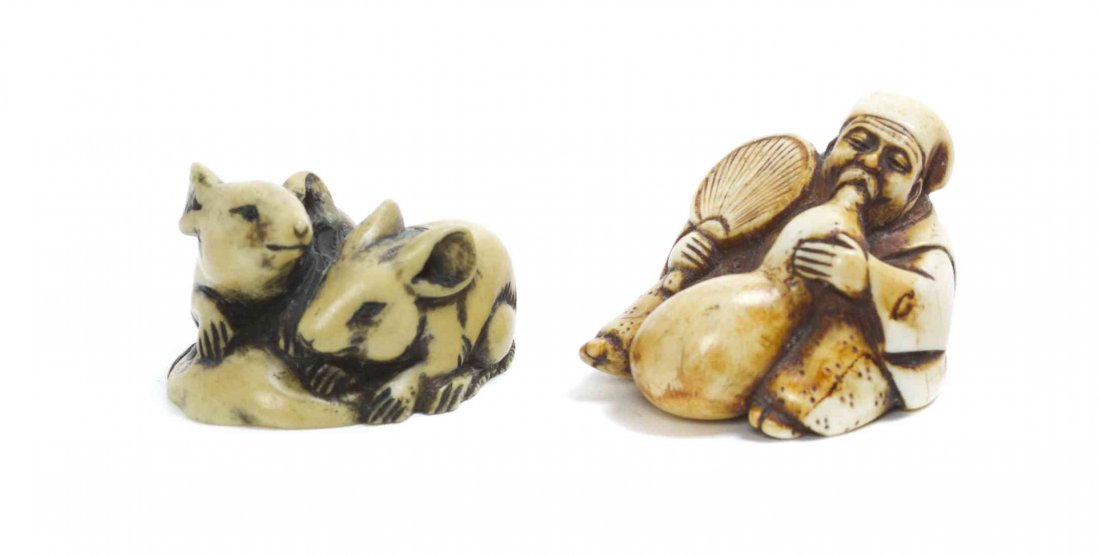 Two Netsuke, Width of first 1 3/4 inches.: Two Netsuke, comprising one stag antler figure with a double gourd, and one of two rats. Width of first 1 3/4 inches. Property from the Collection of Dr. J. Don Nelson, Fargo, North Dakota Provenance: