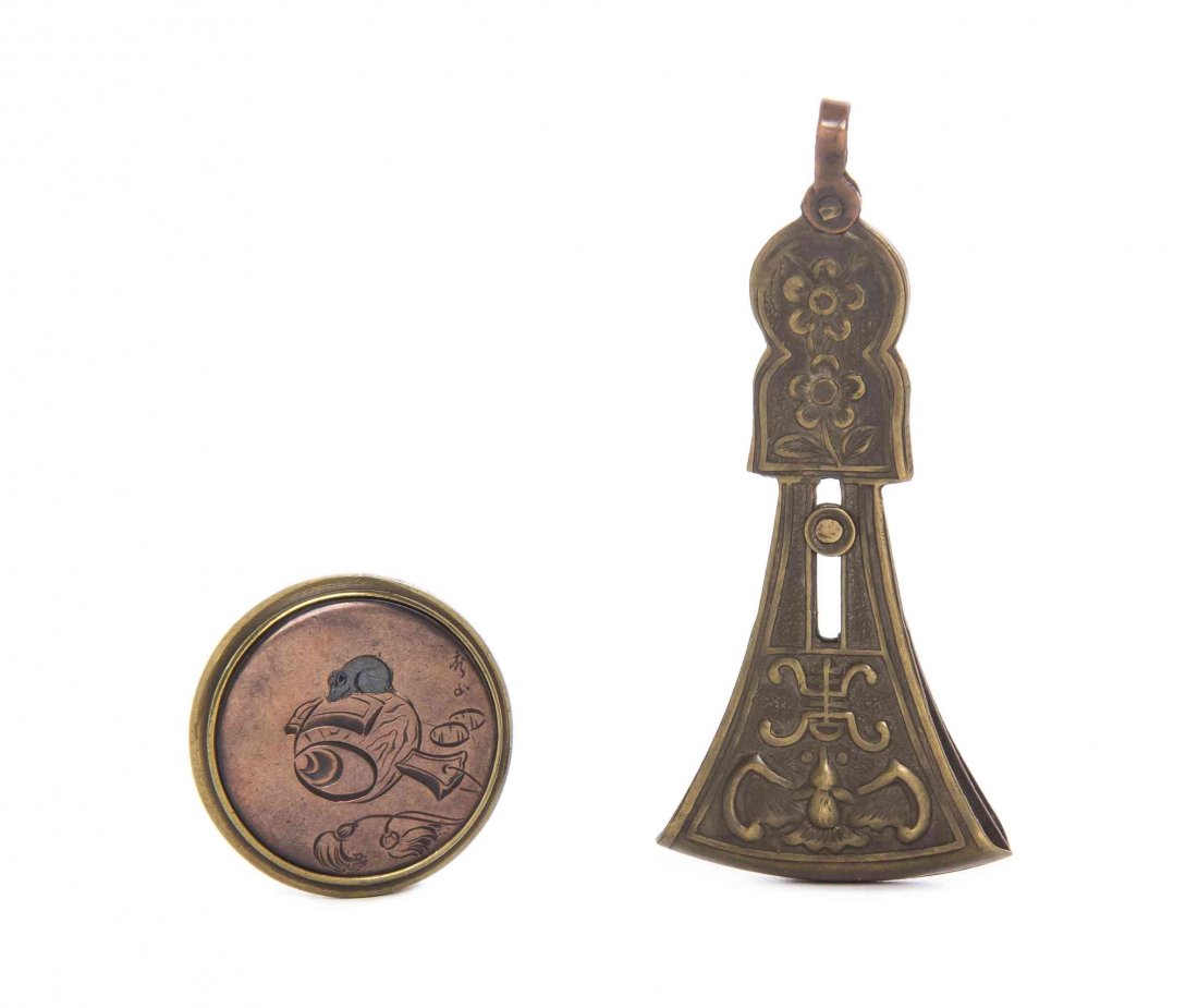 A Japanese Gilt Metal Pendant, Height of taller overall: A Japanese Gilt Metal Pendant, of disc form and having an incised decoration depicting a mouse, signed, together with a Chinese gilt metal axe form pendant depicting flowers above a pierced register a