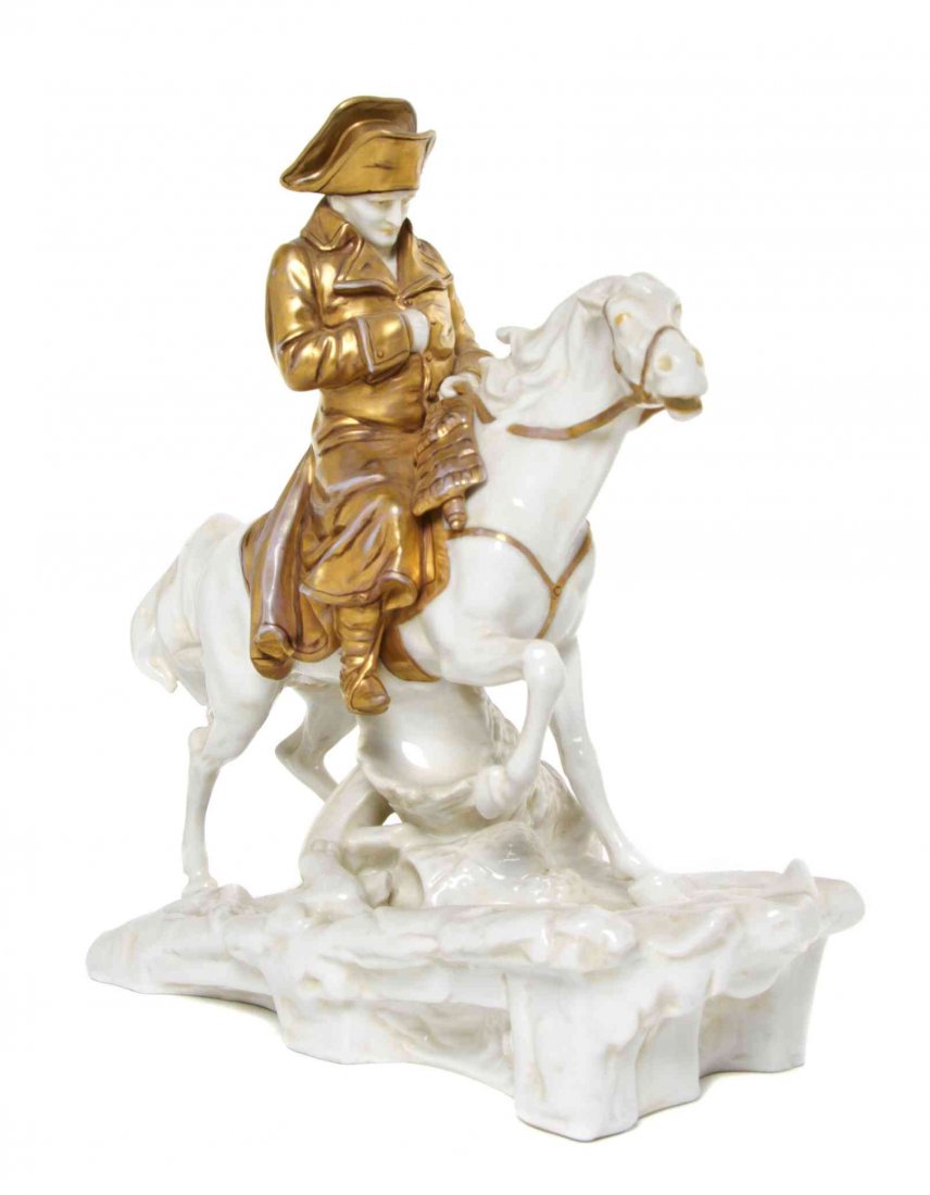 A German Porcelain Napoleonic Equestrian Group, Height: A German Porcelain Napoleonic Equestrian Group, depicting Napoleon seated on his horse riding over a snowy ground, having printed crossed S mark. Height 9 3/4 inches. Property from the Ann Stone Trust