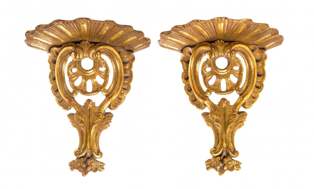 A Pair of Louis XV Style Gilt Terra Cotta Wall: A Pair of Louis XV Style Gilt Terra Cotta Wall Brackets, each worked to show foliate scrolls and shell forms. Height 11 1/2 inches.