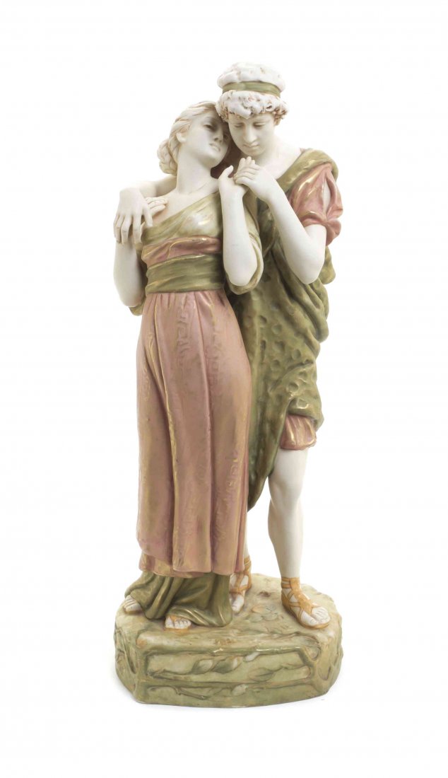 A Royal Dux Porcelain Figural Group, Height 18 1/2: A Royal Dux Porcelain Figural Group, depicting a courting couple in classical attire. Height 18 1/2 inches.