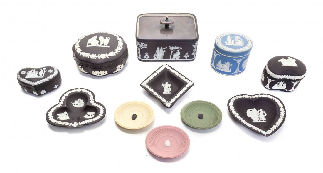 Five Wedgwood Jasperware Covered Boxes, Diameter of: Five Wedgwood Jasperware Covered Boxes, comprising four black examples including a rectangular example with a silvered lid, a floriform example, a cushion shaped example, and a heart shaped example, a