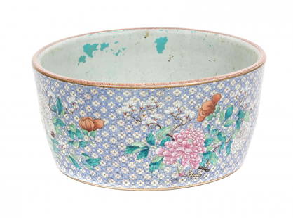 A Chinese Export Porcelain Jardiniere, Diameter 21: A Chinese Export Porcelain Jardiniere, with floral decoration on a blue quatrefoil ground. Diameter 21 inches.