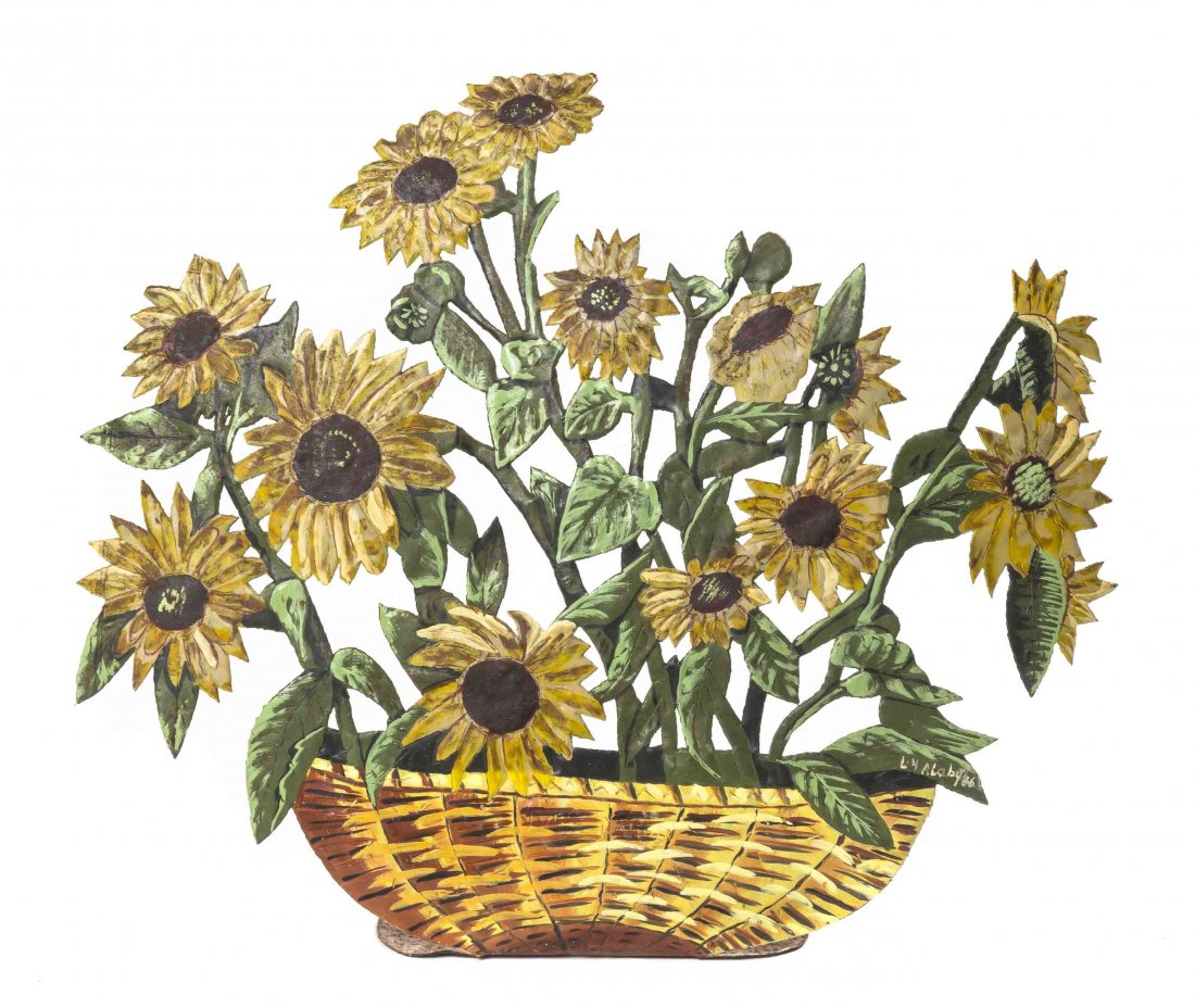 A Painted Tole Model of Sunflowers, Height 15 3/4: A Painted Tole Model of Sunflowers, depicted issuing from a basket. Height 15 3/4 inches.