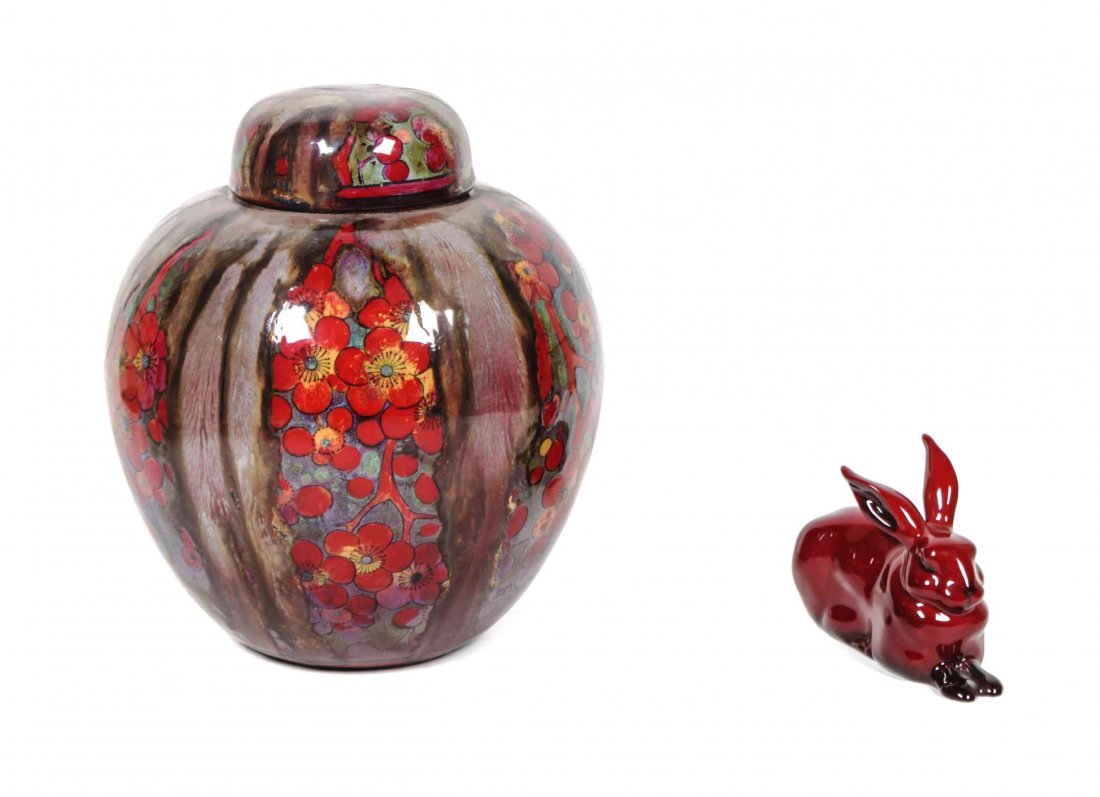 A Royal Doulton Sung Glazed Ginger Jar, Noke and Moore,: A Royal Doulton Sung Glazed Ginger Jar, Noke and Moore, of ovoid form with lid, together with a Royal Doulton flambe figure of a rabbit. Height 7 3/4 inches.