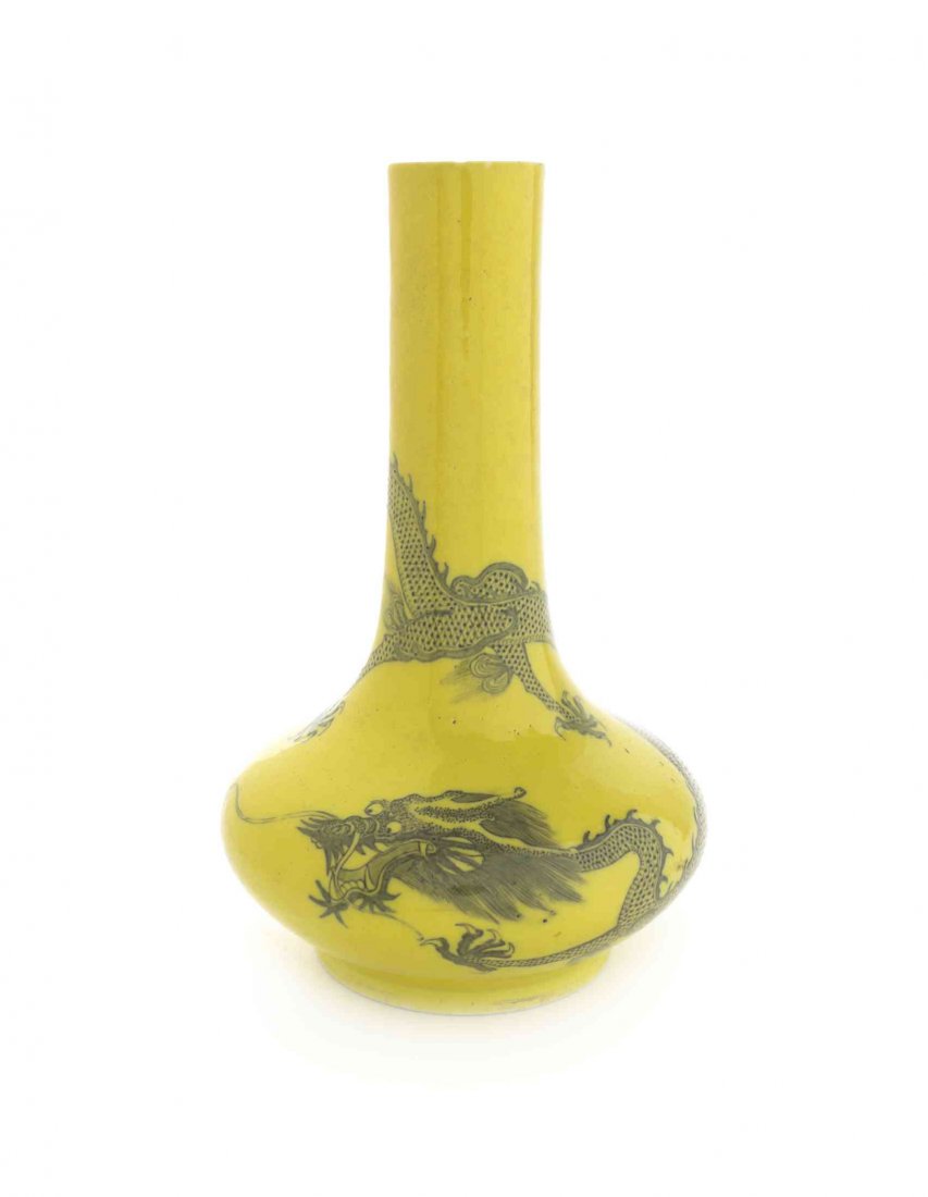 A Grisaille Enamel Porcelain Bottle Vase, Height 8 1/2: A Grisaille Enamel Porcelain Bottle Vase, likely early 18th century, having a yellow glaze ground with enamel decoration of a five-claw dragon writhing and wrapped around the body and base of the neck