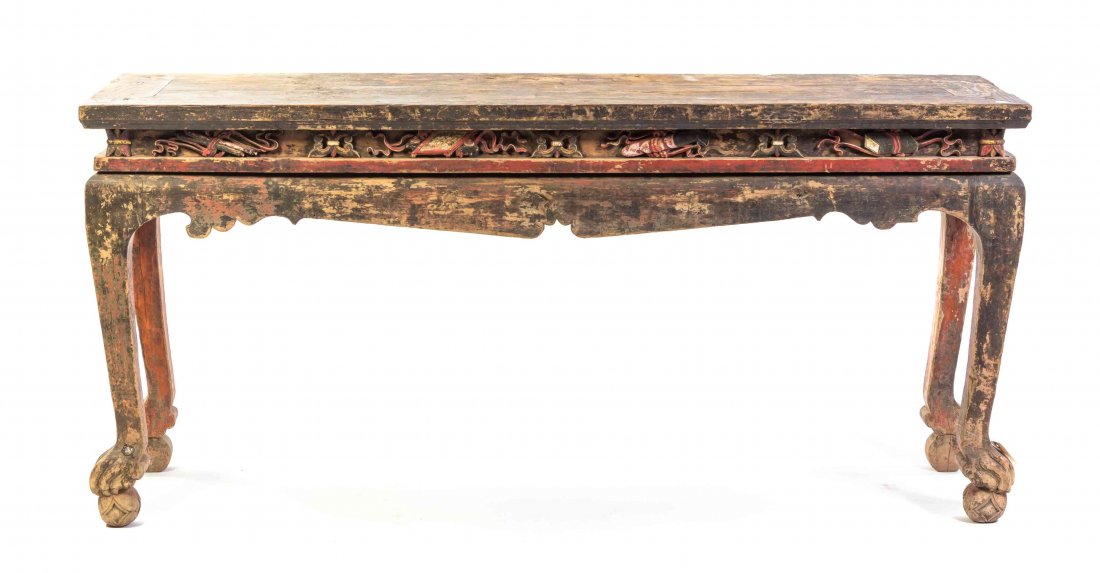 A Painted Wood Altar Table, Height 33 x width 70 x: A Painted Wood Altar Table, likely Ming Dynasty, the plank top over the recessed waist having painted and carved decoration depicting Daoist emblems, above a bowed apron, raised on slightly recessed l