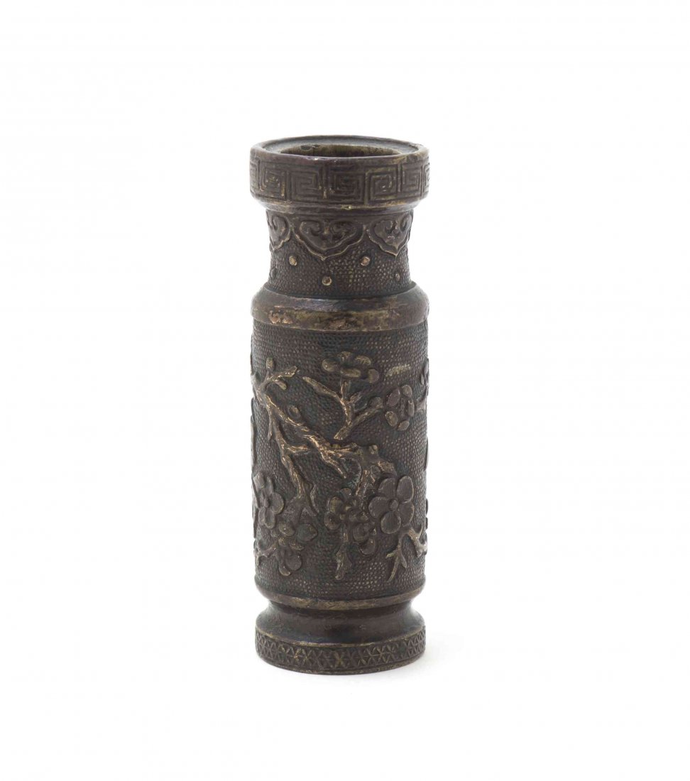 A Bronze and Gilt Tool Vase, Attributed to Hu Wen Ming,: A Bronze and Gilt Tool Vase, Attributed to Hu Wen Ming, Ming Dynasty, of cylindrical, waisted form with raised foliate decoration, having traces of gilt to the foliage. Height 4 1/4 inches.