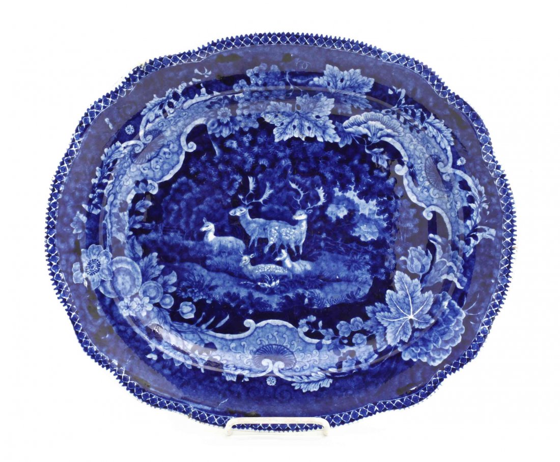 A Historical Blue Staffordshire Platter, Adams, Width: A Historical Blue Staffordshire Platter, Adams, depicting a family of deer in a grassy knoll, the underside bearing an impressed Adams mark. Width 15 1/2 inches. Property from the Estate of G.L. Conne