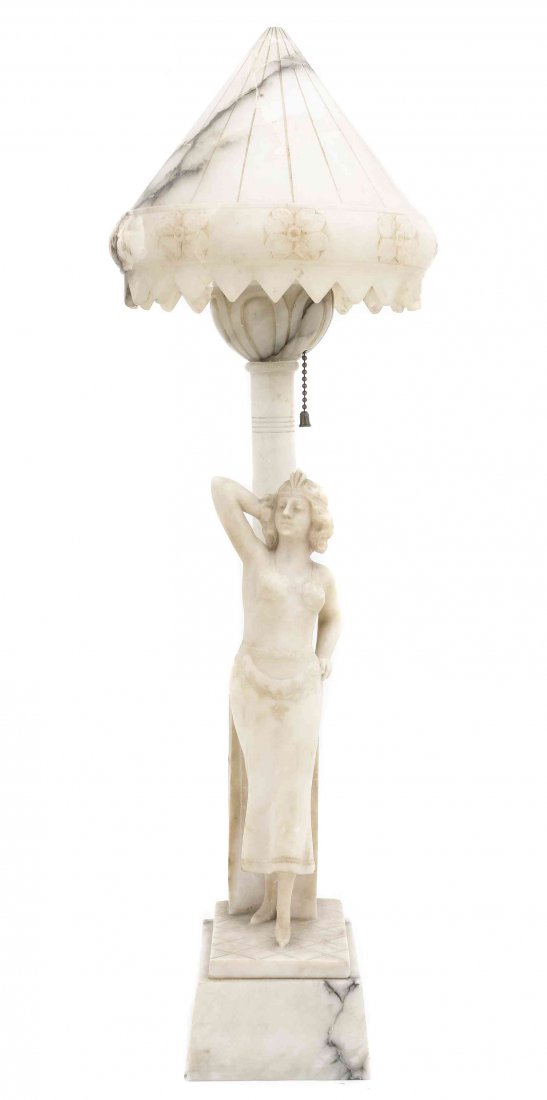 A Carved Alabaster Figural Lamp, Height 24 1/8 x width: A Carved Alabaster Figural Lamp, depicting a standing woman. Height 24 1/8 x width 7 3/4 x depth 6 inches. Property from the Collection of a Lady, Shorewood, Wisconsin.