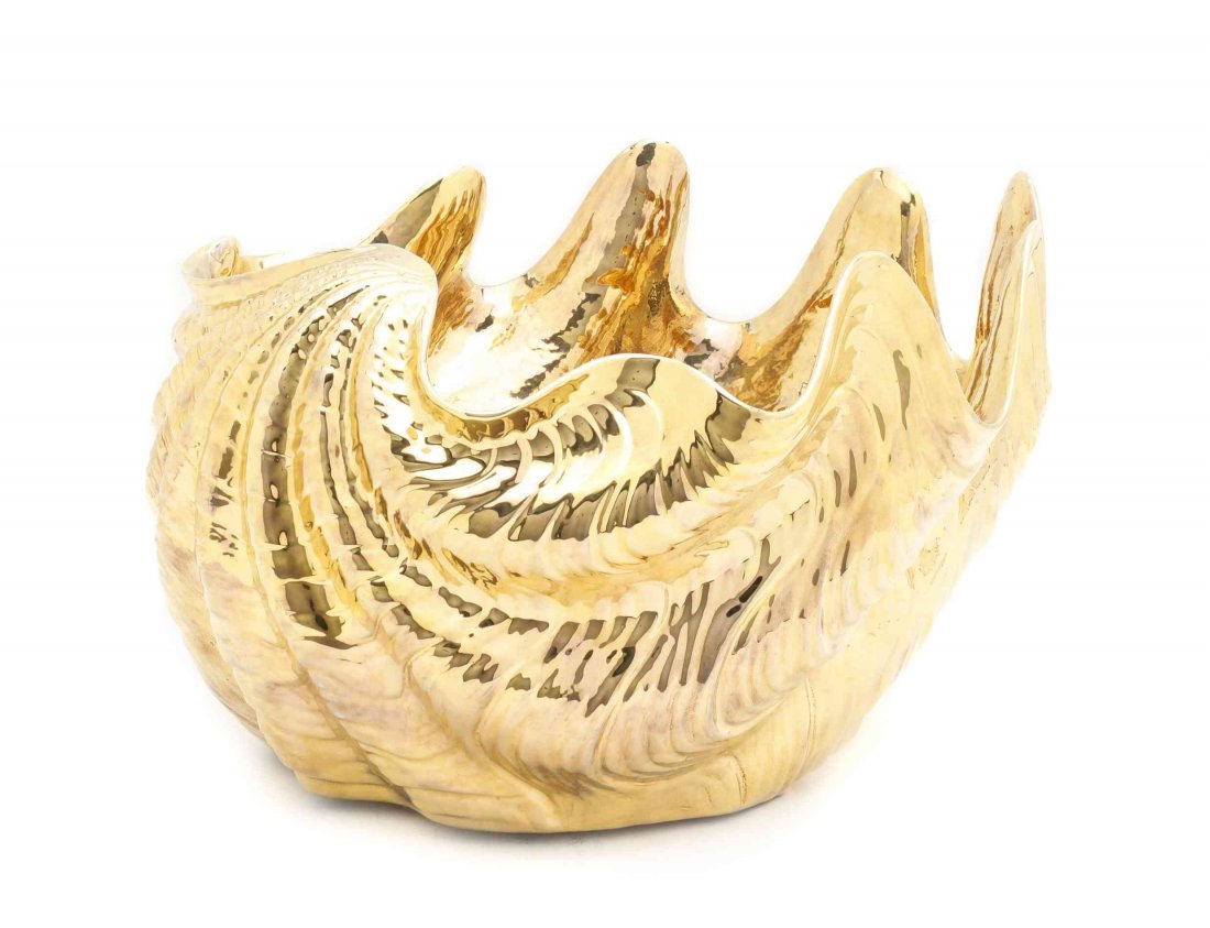 A Porcelain Vessel, Height 9 3/8 x width 13 1/4 x depth: A Porcelain Vessel, in the form of a shell. Height 9 3/8 x width 13 1/4 x depth 16 1/4 inches. Property from the Collection of Shirley Langer, Milwaukee, Wisconsin