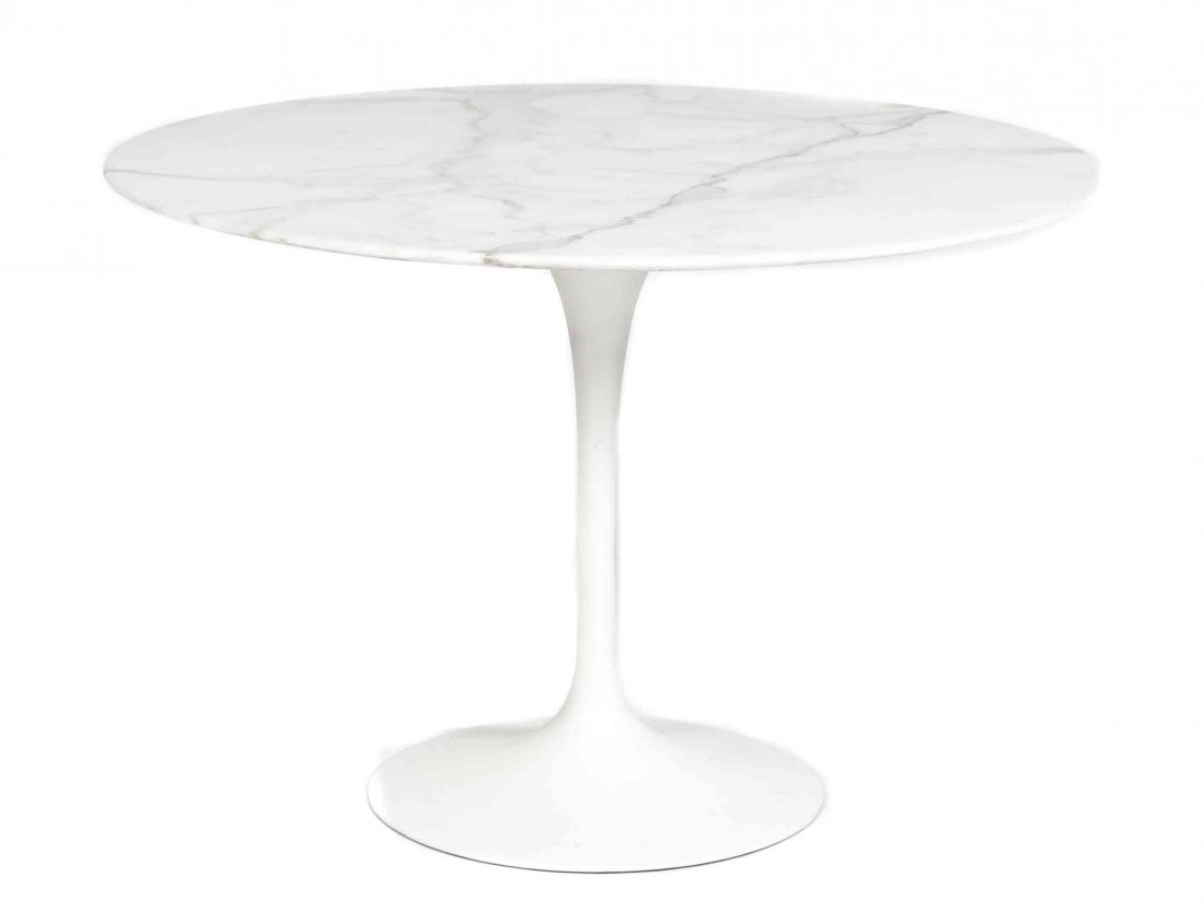 An Eero Saarinen Tulip Occasional Table, for Knoll,: An Eero Saarinen Tulip Occasional Table, for Knoll, having a circular, marble top over a fluted base ending in a circular foot. Height 28 x diameter 42 inches. Property from the Estate of Dr. Leslie L