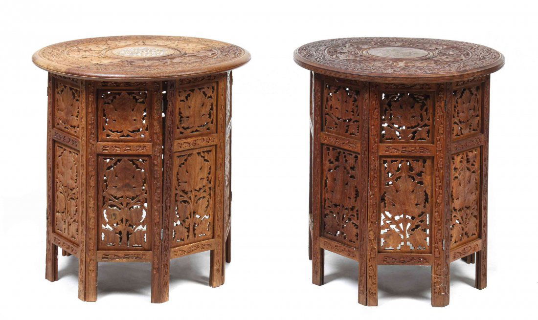 A Near Pair of Iranian Wood Tables, Height 22 x: A Near Pair of Iranian Wood Tables, each with a center composite inlay scrolling leaf decoration surrounded by a carved leaf and berry motif, further surrounded by a carved floral pattern, atop a pier