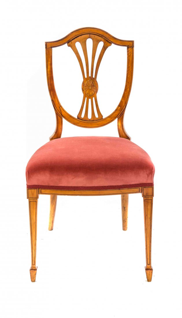 An American Hepplewhite Style Maple Side Chair, Height: An American Hepplewhite Style Maple Side Chair, having a shield shaped back, over the upholstered seat, raised on square tapering legs ending in spade feet. Height 36 inches. Property from the Estate 