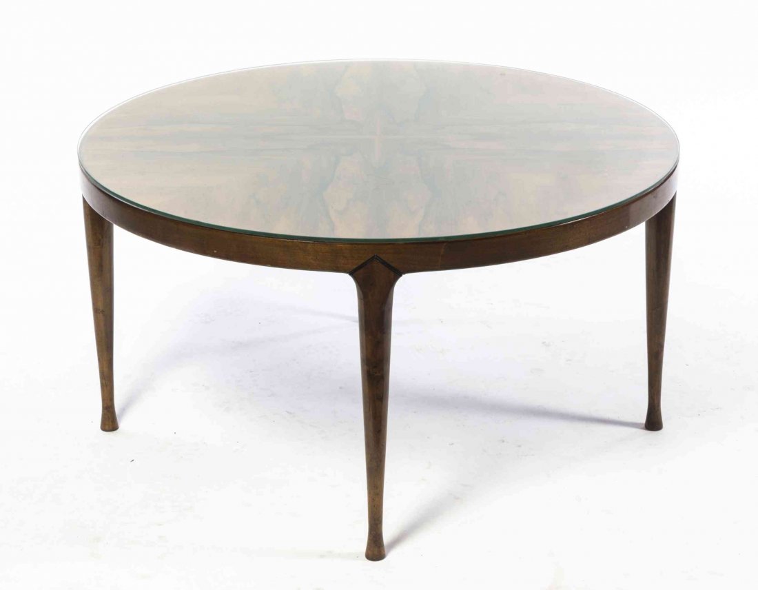 A Scandinavian Walnut Low Table, Aase Mobler, Height 18: A Scandinavian Walnut Low Table, Aase Mobler, having a circular top raised on tapering legs. Height 18 x diameter 38 inches. Property from the Collection of Richardson and Janice Spofford and the Thom