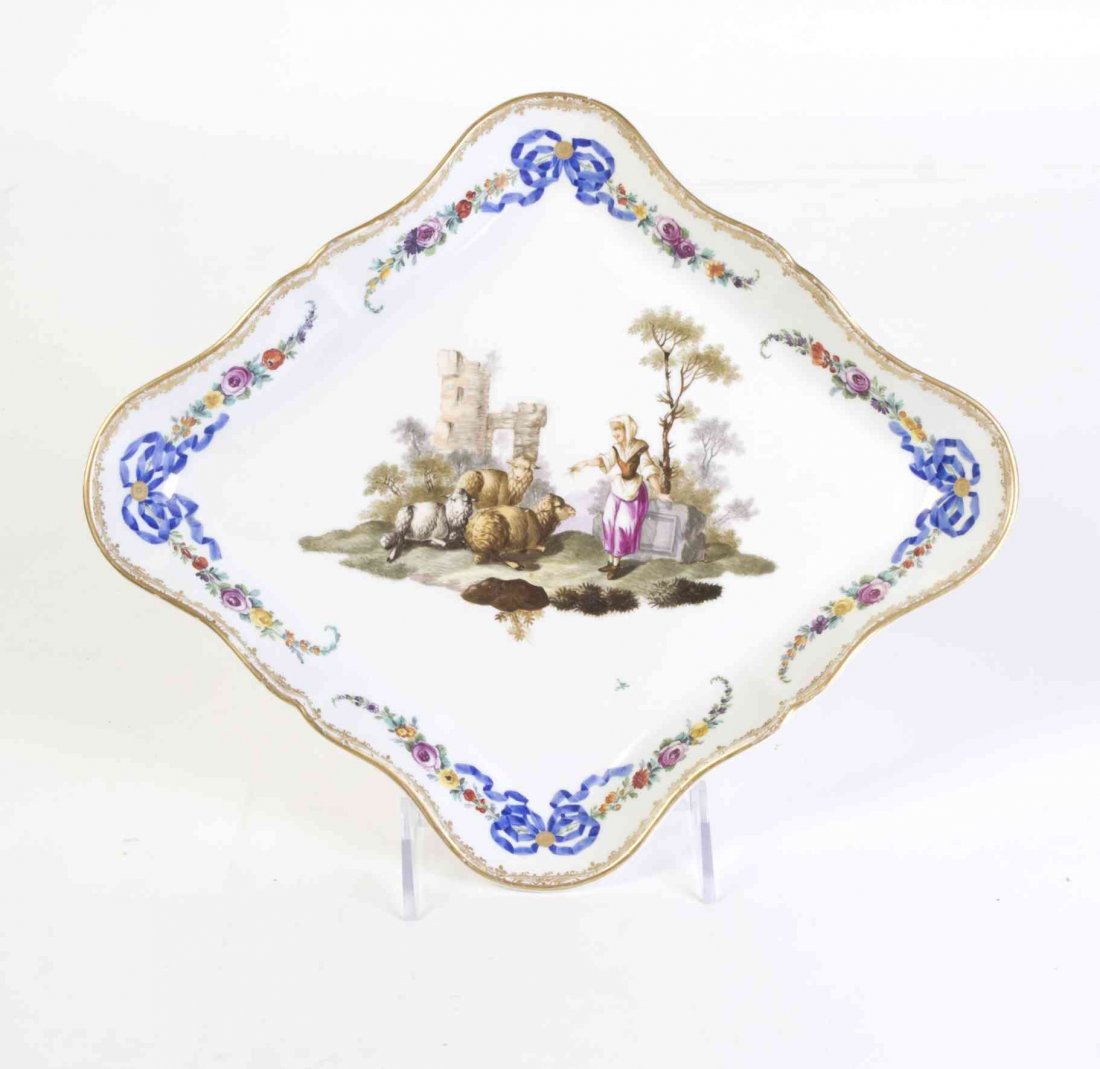 A German Porcelain Dish, Length 11 3/4 inches.: A German Porcelain Dish, of triangular form, decorated with a shepherdess and sheep before the ruins of a tower. Length 11 3/4 inches. Property from the Collection of Thomas D. and Joyce J. Allen, Chi