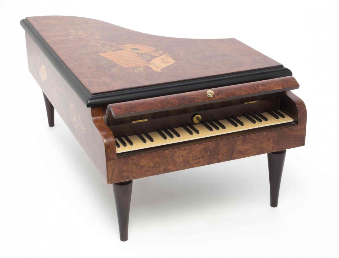 A Marquetry Decorated Burlwood Piano Form Music Box,: A Marquetry Decorated Burlwood Piano Form Music Box, Reuge, modern, playing the Thieving Magpie (in three parts) as listed on the tomb card. Length 14 1/2 inches.
