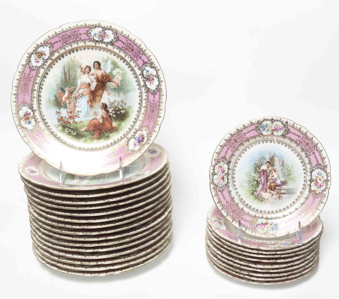 A Royal Vienna Style Porcelain Partial Dinner Service,: A Royal Vienna Style Porcelain Partial Dinner Service, comprising 16 dinner plates and 10 dessert plates, each transfer decorated with figures within pink borders. Diameter of dinner plates 9 1/2 inch