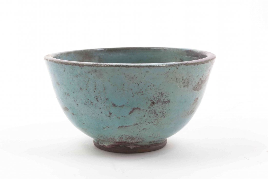 A Jugtown Pottery Bowl, Diameter 7 1/2 inches.: A Jugtown Pottery Bowl, of footed form, with a drip glaze. Diameter 7 1/2 inches. Property from the Estate of Norman and Dorothy Holmes, Wilmette, Illinois