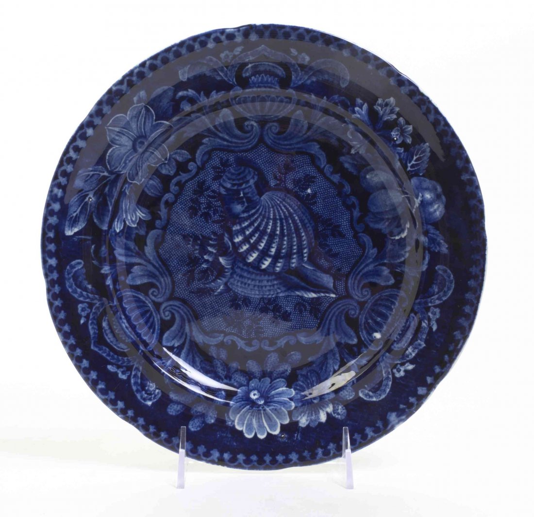 An English Transfer Decorated Plate, Stubbs & Kent,: An English Transfer Decorated Plate, Stubbs & Kent, Longport, centered with shells within a floral fruit border. Diameter 10 inches. Property from the Estate of Norman and Dorothy Holmes, Wilmette, Il