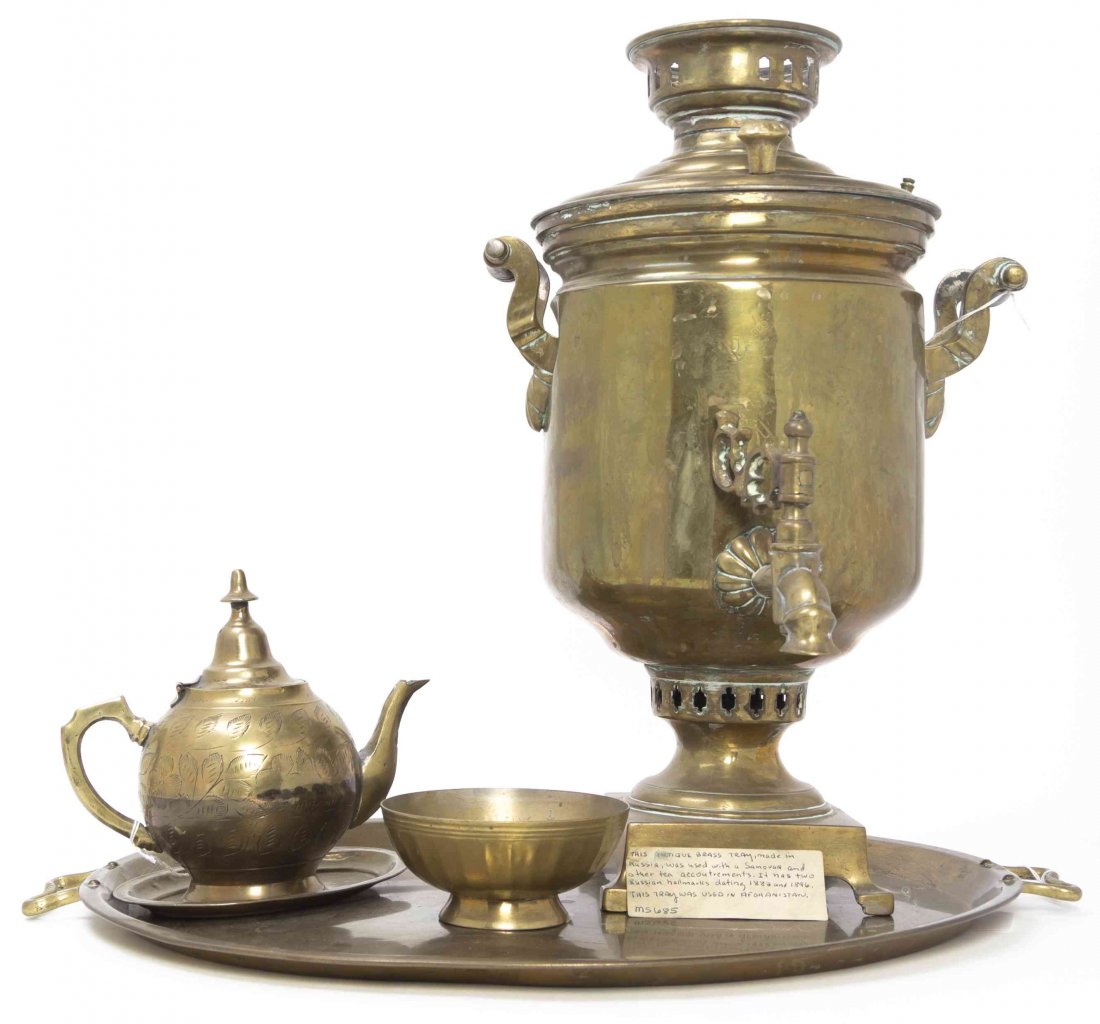 A Russian Brass Samovar, Height 20 inches.: A Russian Brass Samovar, of typical form, with a tray and a bowl, together with a kettle. Height 20 inches. Property from the Collection of Richardson and Janice Spofford and the Thomas Edward Wilson 