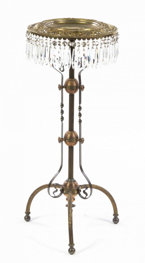 A Victorian Brass Calling Card Tray on Stand, Height 31: A Victorian Brass Calling Card Tray on Stand, the tray of circular form with a pierced rim and roundel depicting a woman with a putto, hung with prisms. Height 31 1/2 inches.