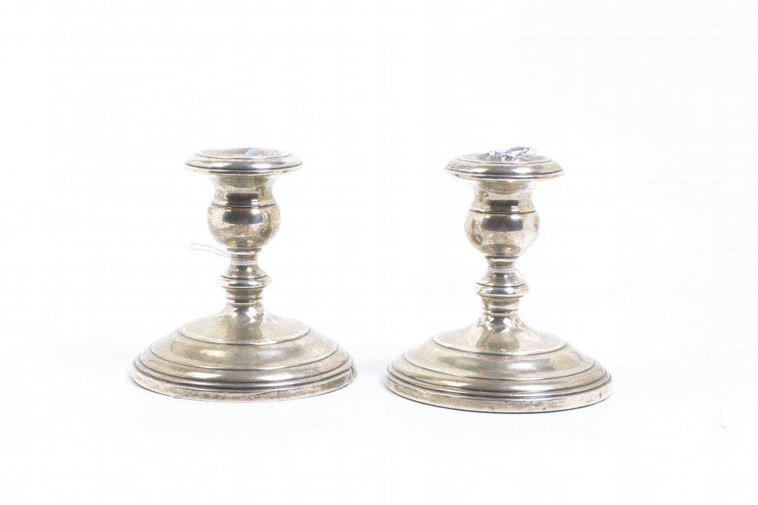 A Pair of American Silver Candlesticks, Height 4: A Pair of American Silver Candlesticks, each of short baluster form, with felted base, weighted. Height 4 inches. Property from the Estate of Norman and Dorothy Holmes, Wilmette, Illinois