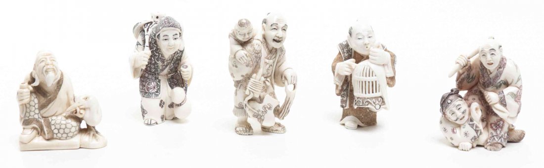 A Group of Ten Carved Ivory Netsuke, Height of tallest: A Group of Ten Carved Ivory Netsuke, some with polychrome decoration. Height of tallest 2 3/8 inches.