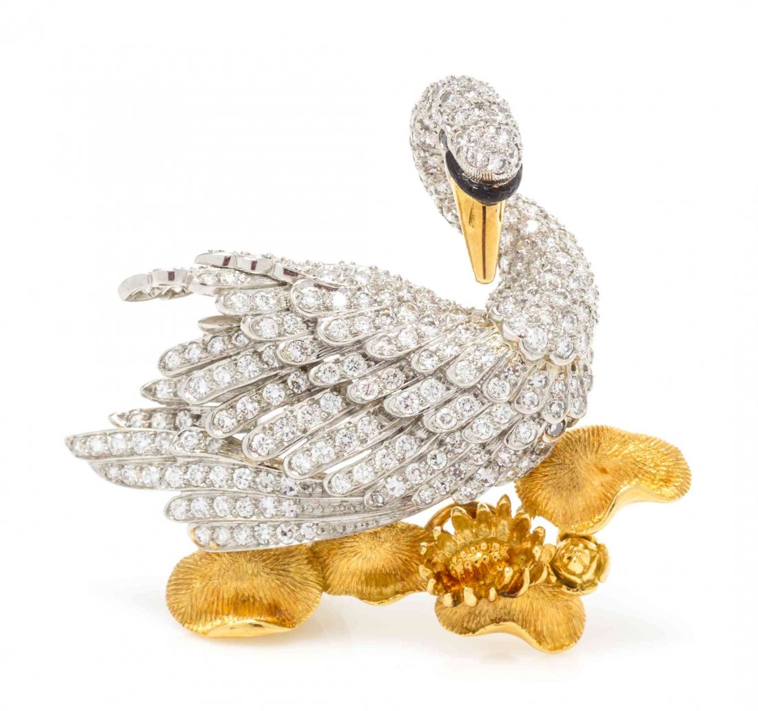 A Platinum, 18 Karat Yellow Gold, Enamel and Diamond: A Platinum, 18 Karat Yellow Gold, Enamel and Diamond Swan Brooch, McTeigue, consisting of the sculpted platinum swan accented with black enamel above the textured gold base, containing 122 round brill