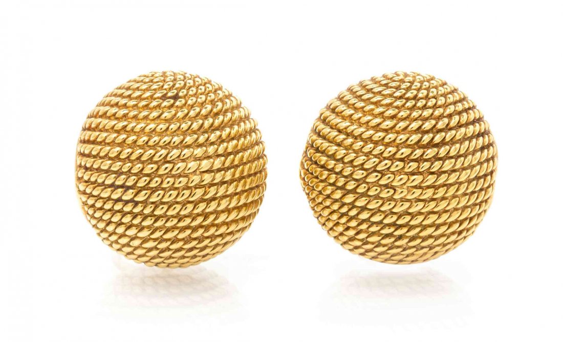 A Pair of 18 Karat Yellow Gold Earclips, Chimento, 8.20: A Pair of 18 Karat Yellow Gold Earclips, Chimento, in a textured domed design, measuring approximately 26.00 mm wide. Stamp: 750 CHIMENTO (maker's mark). 8.20 dwts. Property from the Estate and Trust