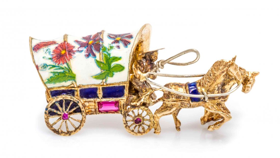 A Collection of 14 Karat Yellow Gold, Enamel, Diamond: A Collection of 14 Karat Yellow Gold, Enamel, Diamond and Ruby Jewelry, consisting of a covered wagon brooch containing one round brilliant weighing approximately 0.15 carat, two round cut rubies, one