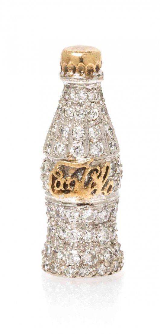 A Collection of Antique Charms, 9.20 dwts.: A Collection of Antique Charms, consisting of a Coca-Cola pendant pave set with numerous round cut diamonds, together with yellow gold, enamel and carnelian charm/seal, consisting of a figure wearing 