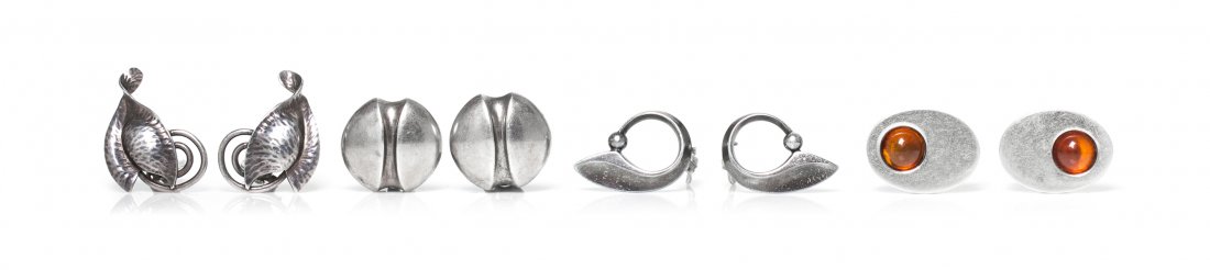 A Collection of Sterling Silver Earclips, 29.60 dwts.: A Collection of Sterling Silver Earclips, consisting of a pair of silver earclips Hans Hansen, a pair of silver earclips by CFO, a pair of silver earclips by Jondell of Spain together with a pair of s