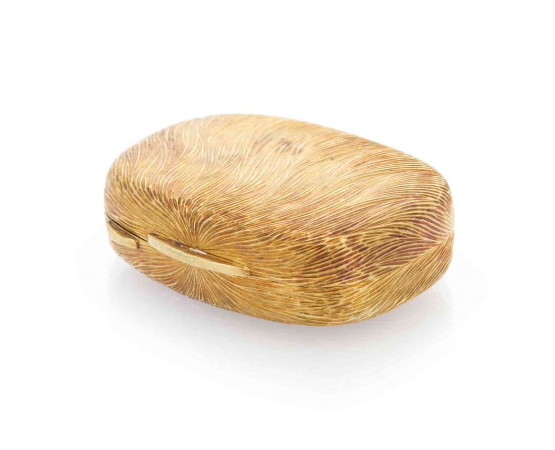 An 18 Karat Yellow Gold Pill Box, 12.90 dwts.: An 18 Karat Yellow Gold Pill Box, with 3 loose pearls. 12.90 dwts. Property from the Estate and Trust of Elise Reeder Olton, Boca Raton, Florida