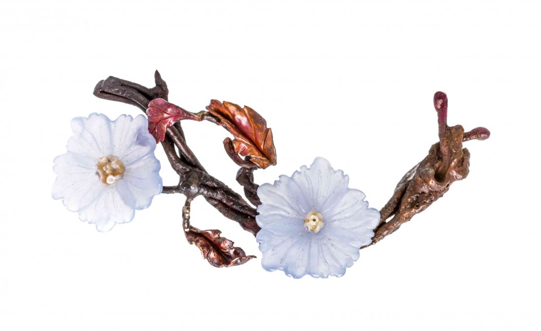 A Copper Flower Motif Brooch, 20.80 dwts.: A Copper Flower Motif Brooch, consisting of a hand-wrought patinaed copper branch containing two carved blue chalcedony flowers with carved mother-of-pearl centers. Brooch stamp: Copper DA (makers mar