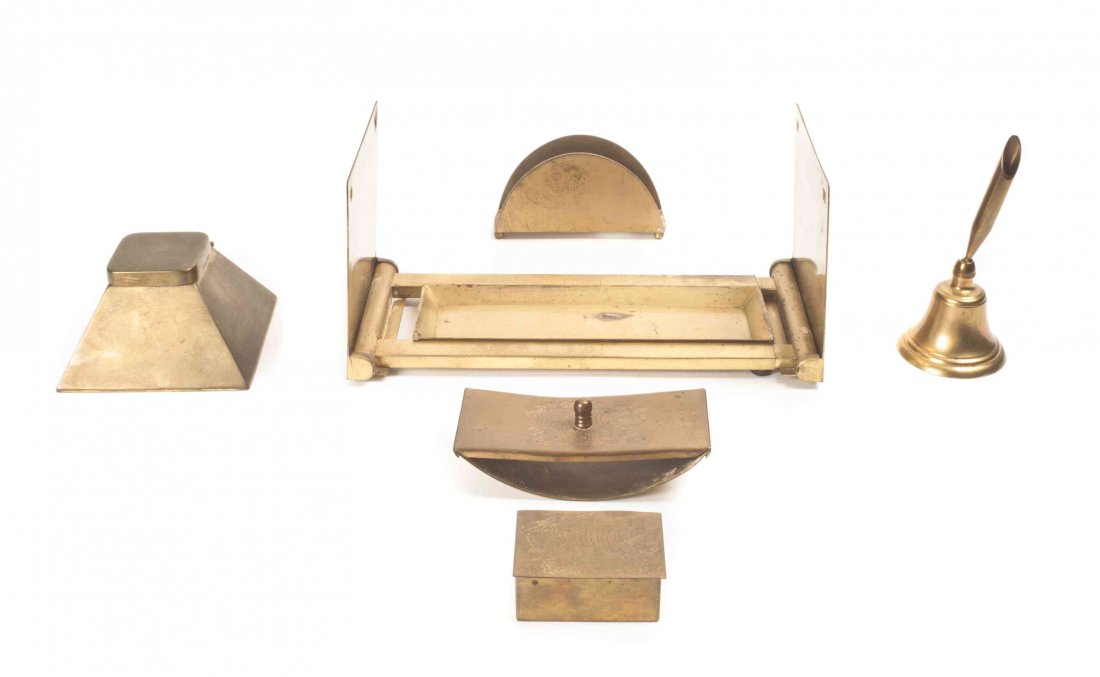 A Group of Six Stationary Articles, Length of first 10: A Group of Six Stationary Articles, comprising a letter tray, a pyramid shaped inkwell and letter holder by Bradley & Hubbard Mfg. Co.; together with a bell with pen holder and two other articles with