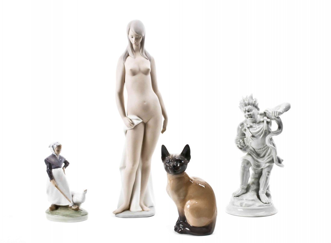 A Collection of Four Porcelain Figures, Height of: A Collection of Four Porcelain Figures, modern, comprising two by Royal Copenhagen (seated Siamese cat, and a girl with a goose), a Lladro standing nude girl, and a Fitz & Floyd blanc de chine figure