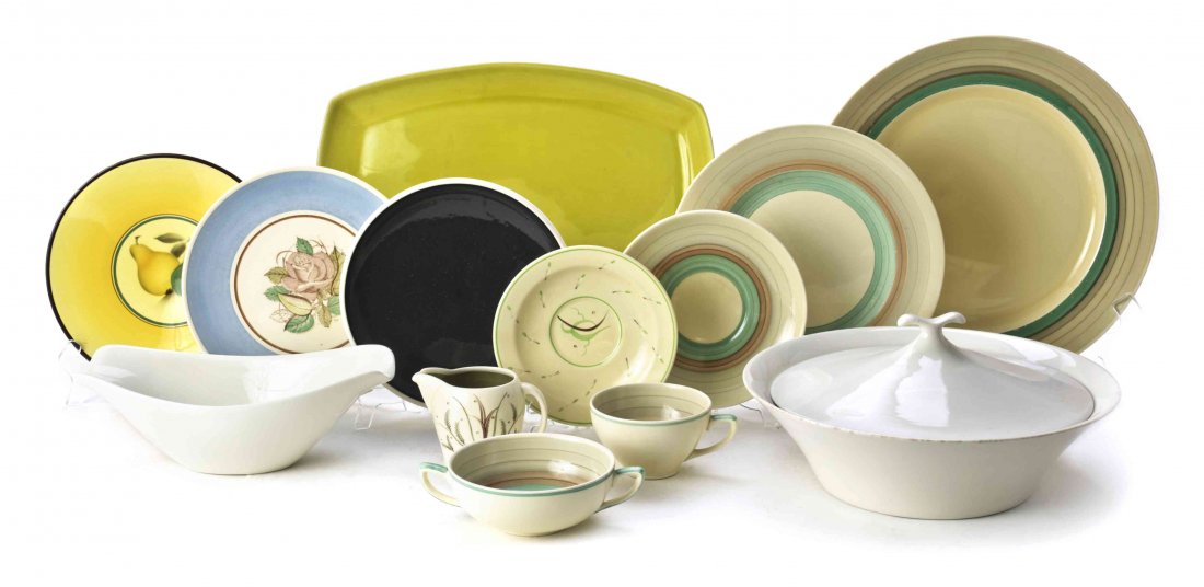 A Group of Modernist Ceramic Table Articles, Length of: A Group of Modernist Ceramic Table Articles, third quarter 20th century, comprising Susie Cooper tea and bouillon cups, dessert plates, saucers, a creamer and a serving bowl, three Ben Seibel Iroquois