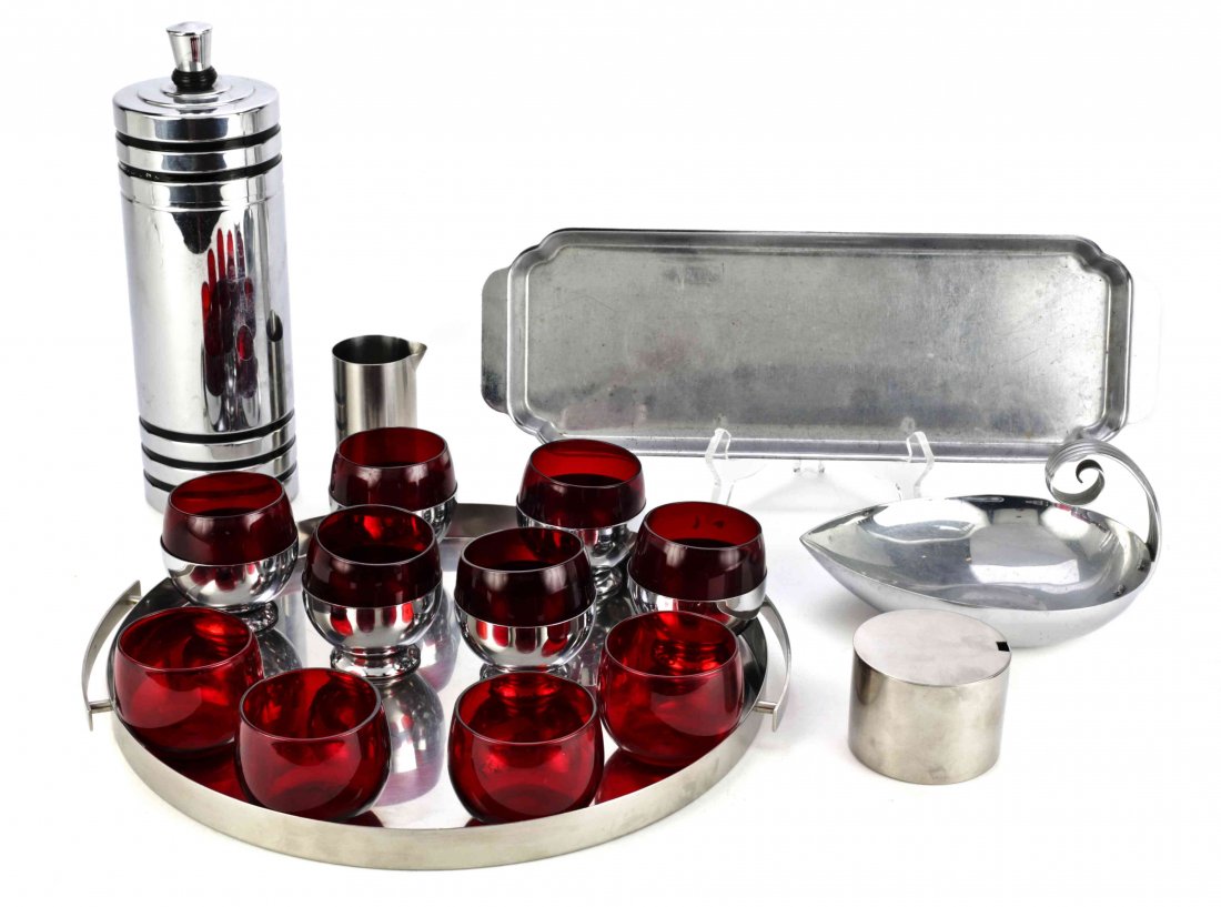 A Group of Metal Table Articles, Length of longest 15: A Group of Metal Table Articles, mid-20th century, comprising a Chase aluminium cocktail shaker, six red-lined glasses and a tray; together with an Arne Jacobsen cream and sugar set and a Russel Wrigh