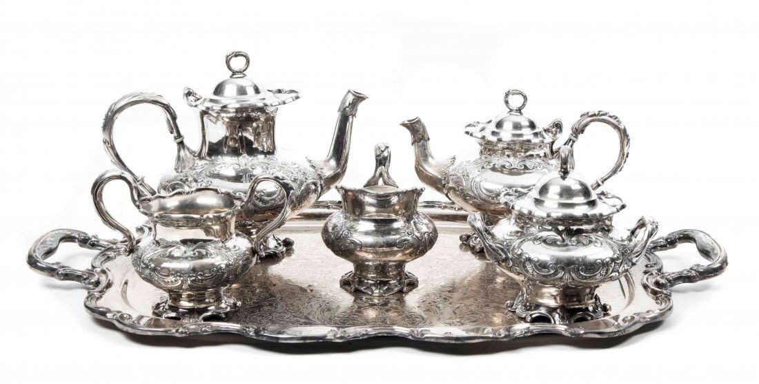 An American Silver-Plate Five-Piece Tea and Coffee Set: An American Silver-Plate Five-Piece Tea and Coffee Set and Associated Tray, Meriden Britannia Co., Meriden. CT, Early 20th Century, comprising a teapot, coffee pot, creamer, covered sugar bowl and was