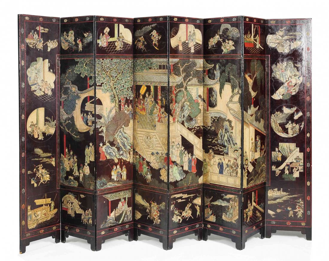 A Chinese Eight Panel Carved and Painted Floor Screen,: A Chinese Eight Panel Carved and Painted Floor Screen, depicting hunt scenes, within a floral decorated border. Height of each panel 68 x width 16 inches.