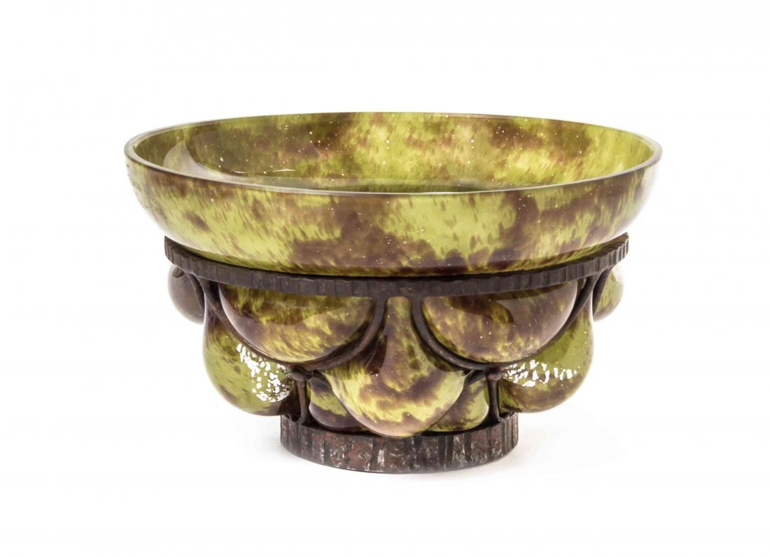 An Andre Delatte Blown-Out Glass and Iron Mounted Bowl,: An Andre Delatte Blown-Out Glass and Iron Mounted Bowl, French (1887-1953), of lobed tapering form with a mottled ground having internal decoration, raised on a circular foot, etched Delatte Nancy. Di