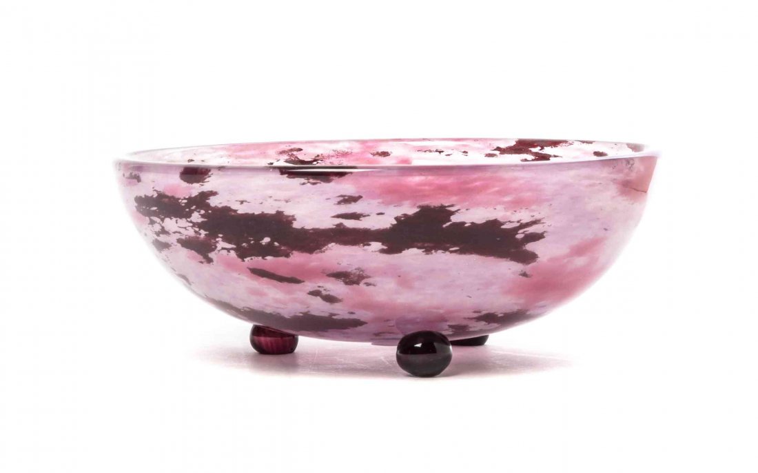 A Charles Schneider Glass Bowl, Diameter 9 inches.: A Charles Schneider Glass Bowl, of tapering form with a mottled pink ground, raised on three spherical feet, etched Schneider France. Diameter 9 inches.