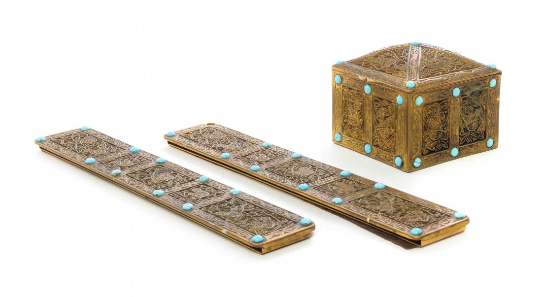 A Tiffany Studios Dore and Favrile Glass Two-Piece Desk: A Tiffany Studios Dore and Favrile Glass Two-Piece Desk Set, in the Ninth Century pattern, comprising an inkwell (1621) and a pair of blotter ends (1623), each stamped Tiffany Studios New York with pa