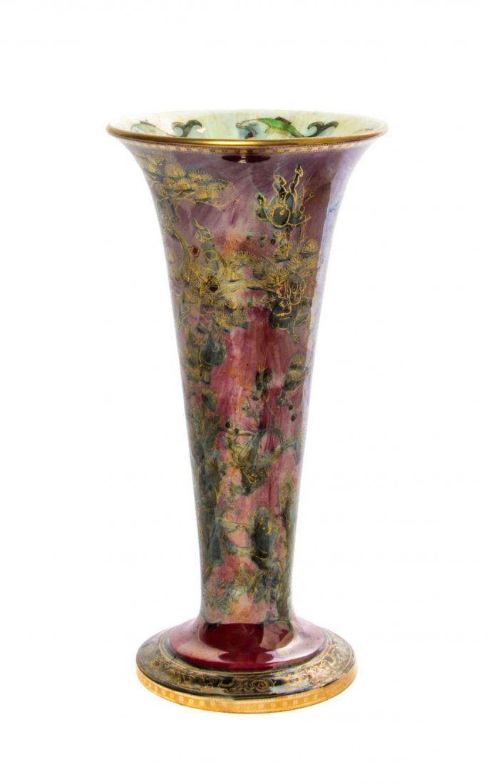 A Wedgwood Fairyland Lustre Firbolgs Vase, Height 10: A Wedgwood Fairyland Lustre Firbolgs Vase, of trumpet form with a red iridescent ground with gilt Firbolgs among folaite decoration, with a printed Wedgwood mark, numbered indistinctly. Height 10 inc