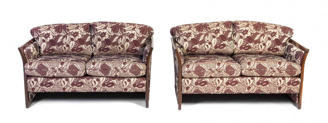 A Pair of French Art Deco Macassar Ebony Settees, Width: A Pair of French Art Deco Macassar Ebony Settees, each having an upholstered back and seat within a macassar ebony frame. Width 54 inches.