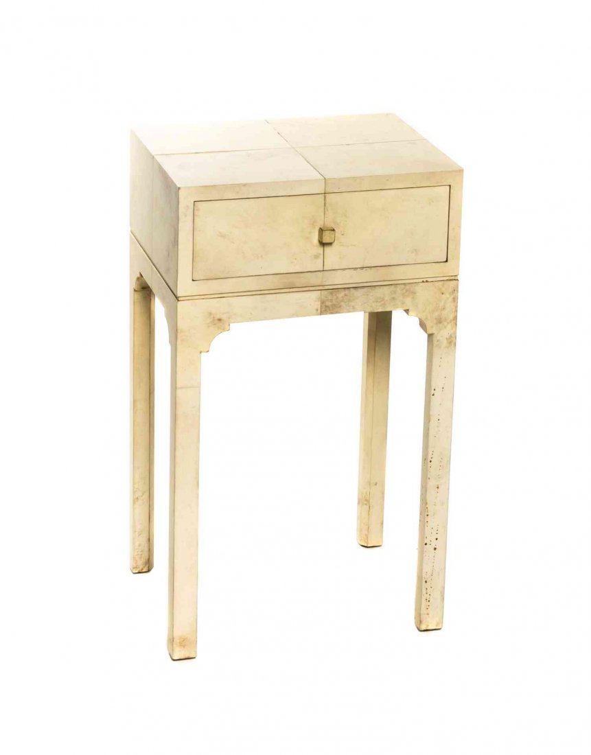 A Faux Parchment Side Table, in the manner of Samuel: A Faux Parchment Side Table, in the manner of Samuel Marx, having a rectangular top over a single drawer, raised on square legs with corner brackets. Height 27 1/2 x width 16 x depth 12 inches.