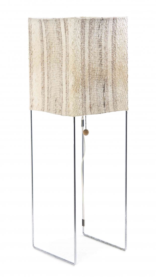 A George Nelson Box Kite Table Lamp, American,: A George Nelson Box Kite Table Lamp, American, (1908-1986), having a rectangular form fabric shade, raised on twin chromed supports. Height 28 1/4 inches.