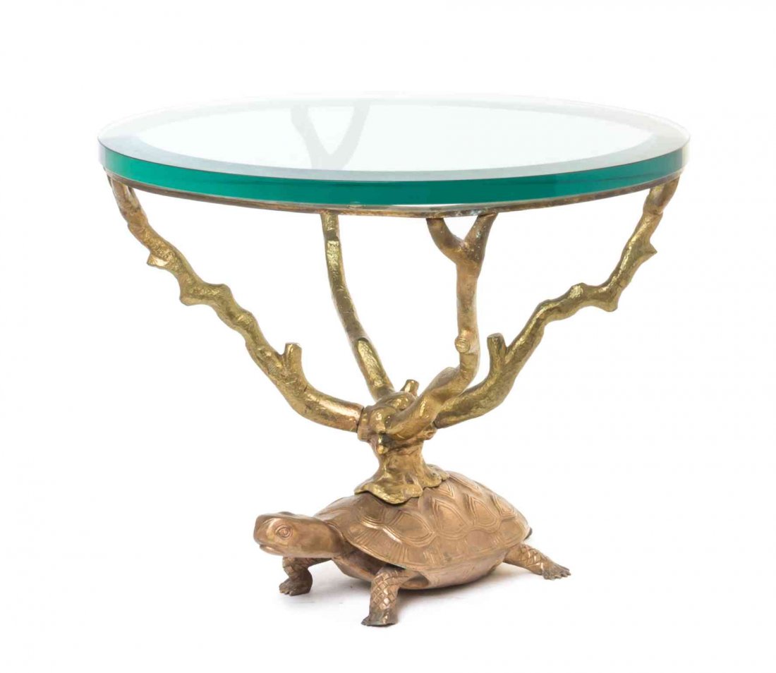 A Gilt Bronze Figural Occasional Table, Height 14 3/4 x: A Gilt Bronze Figural Occasional Table, having a circular glass top, raised on four branch form supports, over a turtle form base. Height 14 3/4 x diameter 17 1/2 inches.