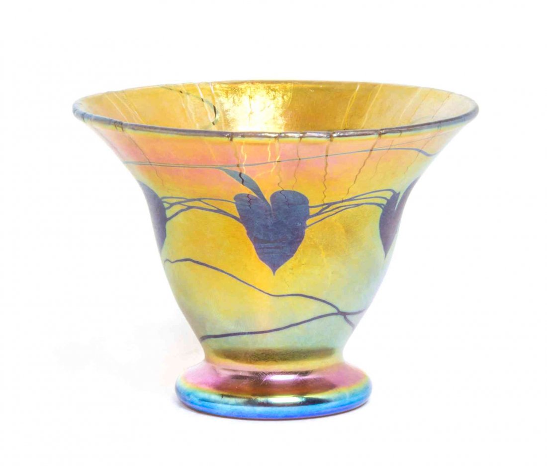 An American Studio Glass Cabinet Vase, Lundberg: An American Studio Glass Cabinet Vase, Lundberg Studios, of tapering form with a crackled rim and pulled heart decoration on a gold iridescent ground, etched Lundberg Studios 2000 and numbered. Height